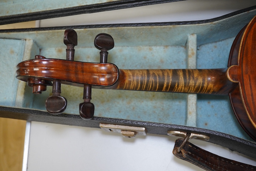 A late 19th century French Chipot-Vuillaume violin, with Edward Withers case, back measures 36cm.